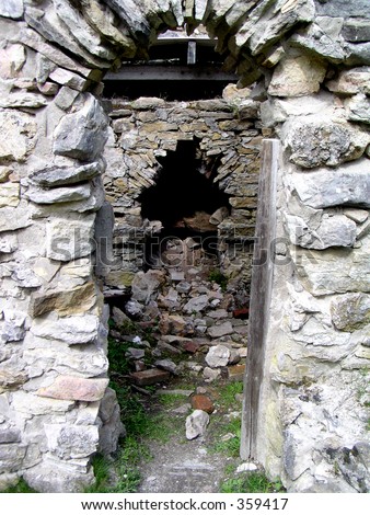 Antique stone bread stove left as it, in the ruins of Valchevriere hamlet, Vercors,France, destroyed during world war II.