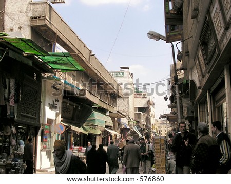 Typical bazaar scene of merchants bargaining in the Bazaar or souk Khan el-Khalili, Cairo, Africa