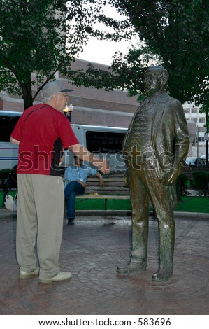 A friendly conversation between seniors in Boston Park, Mass.  View the Entire humorist Senior series