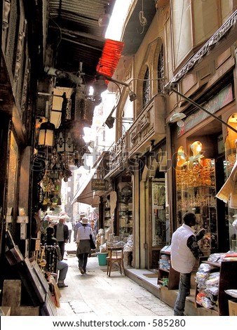 Typical bazaar scene  of merchants bargaining in the Bazaar or souk Khan el-Khalili, Cairo, Africa. See more similar files