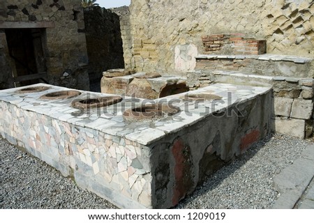 Herculanum Thermopolium or fast foods restaurant,  ruins from the volcano eruption in Herculanum or Ercolano, Naples, Italy,  it had the same use than a fast foods restaurant.