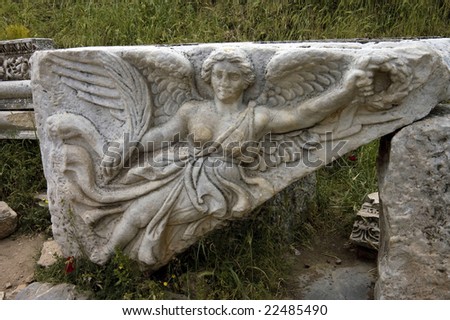 Stone Carving of Greek Goddess Nike, Ephesus, Turkey.  Ancient Greek city also  known as an important center of early Christianity.