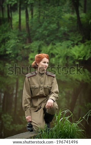 Young woman wearing Red Army form of 1943 year