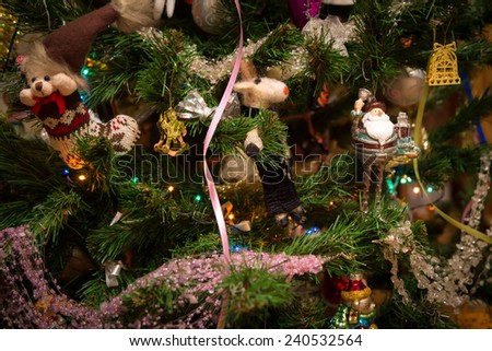 Decorations and multi colored lights on the Christmas tree