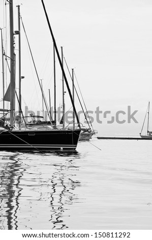 Sail boat at the marina. Black and white