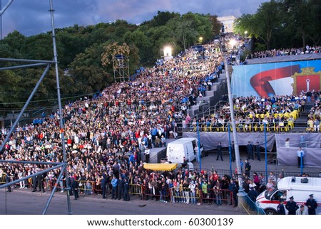 ODESSA, UKRAINE - SEPTEMBER 2: People watch free music festival during the 216th birthday of Ukrainian city Odessa on September 2, 2010 in Odessa. Concert is carried out by the  famous Potemkin Stairs