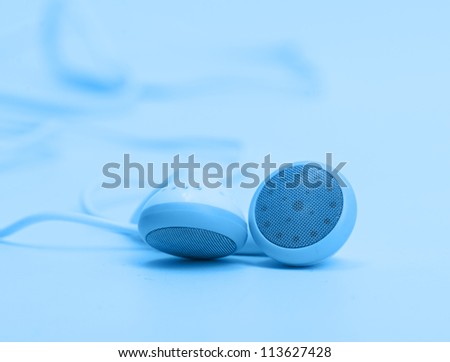 concept of digital music white Headphones blue
