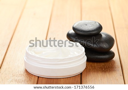 cosmetic cream with herbal flower