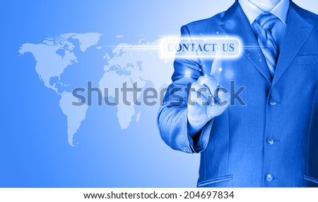 businessman hand pushing contact us button