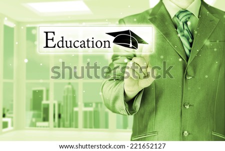 business man pointing \'education\' concept