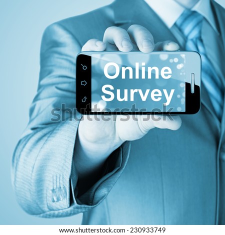 Businessman showing business concept on smartphone  - Online Survey
