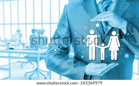 businessman protecting family Insurance concept