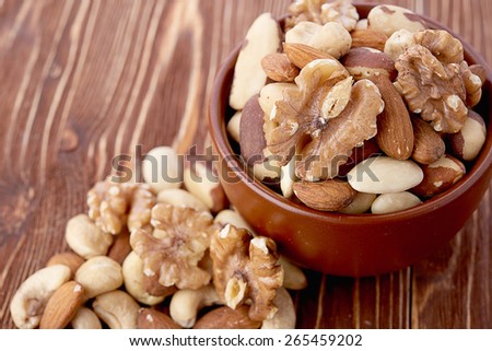Mix nuts  on wooden  background