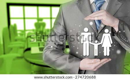 businessman protecting family Insurance concept