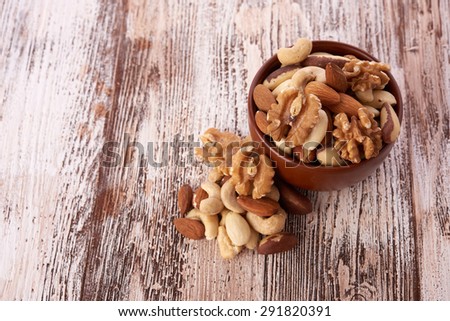 Mix nuts  on wooden background