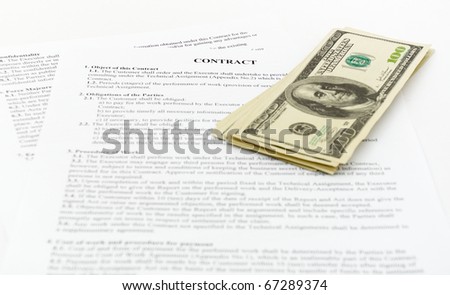 stack hundreds dollars on contract Document background