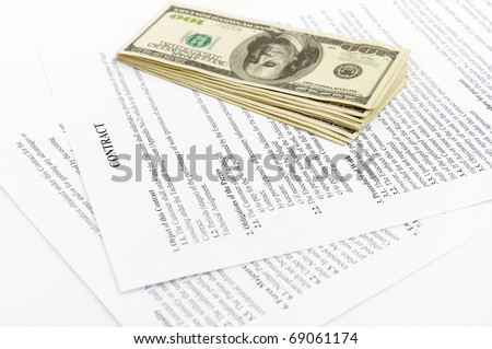 stack hundreds dollars on contract Document background