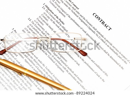 legal contract papers with pen and glasses
