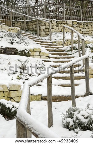 stairs covered by snow in a park