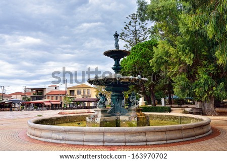 Central square of Filiatra with main city attraction - antique bronze fountain ordered in 1871 in Firenze, Messinia, Greece