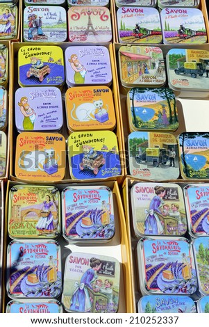PROVENCE, FRANCE - JULY 15, 2014: French soap in various decorative box displayed in a street market in public street. Local soap the most popular souvenir in Provence