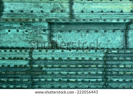 Background of copper coated with a green patina
