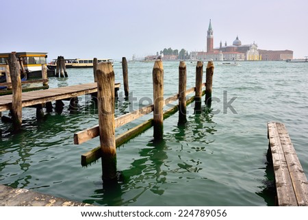 View from  the Venice San Marco seafront on San Giorgio di Maggiore church.Tourists from all the world enjoy the historical city of Venezia in Italy, famous UNESCO World Heritage Site