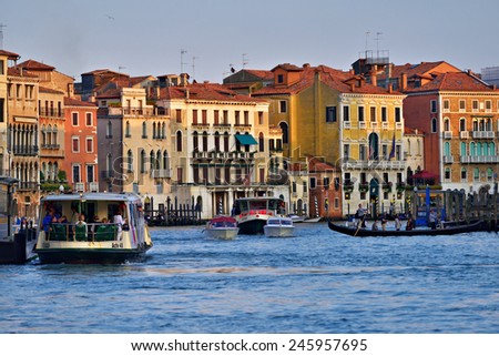 VENICE, ITALY - SEPT 25, 2014: View on the Grand Canal in Venice at sunset. The Grand Canal is the largest canal in Venice, Italy.