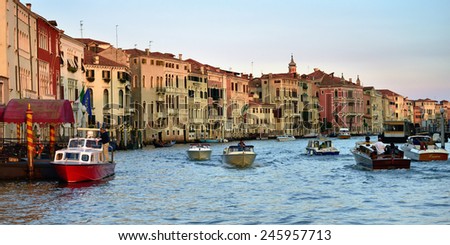 VENICE, ITALY - SEPT 25, 2014: View on the Grand Canal in Venice at sunset. The Grand Canal is the largest canal in Venice, Italy.