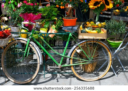 The bike is used as the stall at the village market. Provence, France