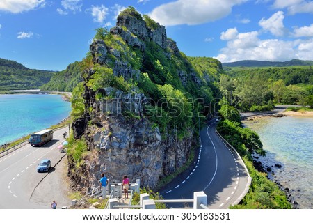 MAURITIUS - APR 28, 2013:  Road around the high cliff on the coast of Indian ocean. Mauritius island is one from preferable destination for luxury holiday in all season \
Mauritius