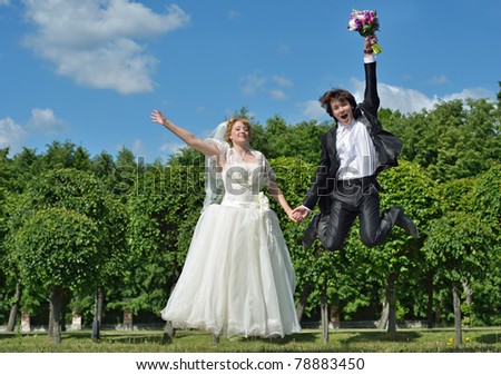 http://image.shutterstock.com/display_pic_with_logo/527677/527677,1307613658,8/stock-photo-a-just-married-couple-very-happy-groom-and-blonde-bride-jump-high-on-their-wedding-day-78883450.jpg