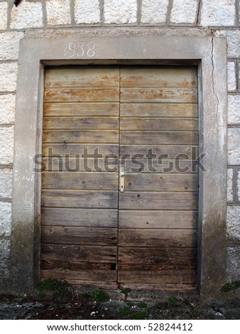 Picture presents old door in a house built in 1938