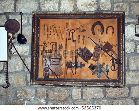 Image shows a old tools in old tavern