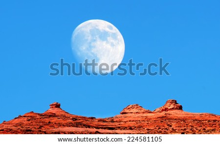 A Large moon over Monument Valley Arizona