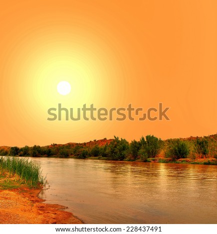 Gila River in Arizona with yellow sunset