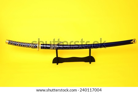 Samurai sword, Katana, Wakizashi, Tanto, isolated on yellow background