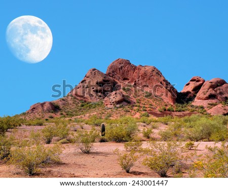 Desert moon over the southwestern USA desert and mountains