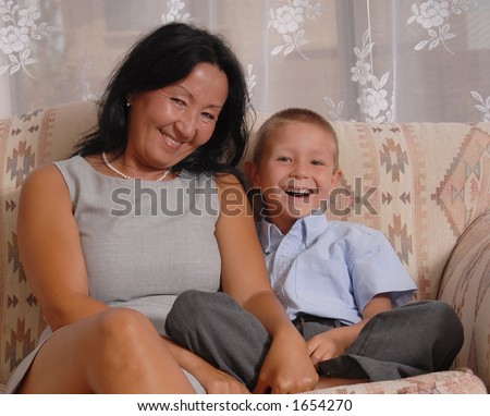 Business woman and son having fun