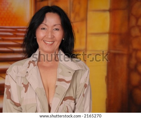 Sexy asian lady wearing military desert camouflage