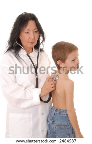 Lovely Doctor or Nurse examining a young boy patient