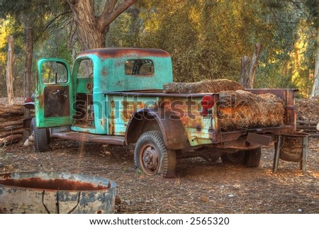 stock photo Broken down and rusty old truck with flat tires