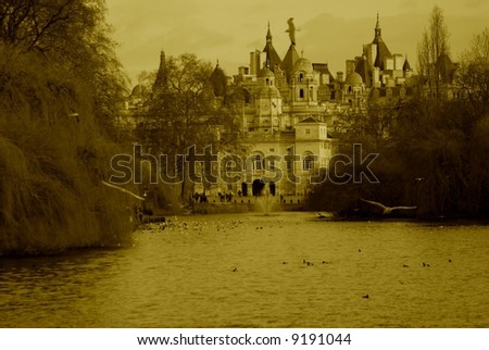 A sepia fairy tale castle with a lake