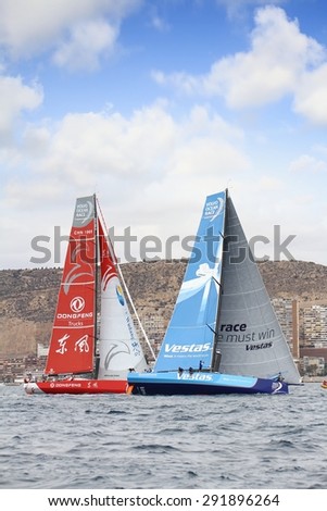 ALICANTE, SPAIN - OCTOBER 04: The sail boat of the Team Vestas Wind and Dongfeng are sailing in the 