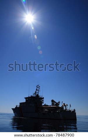 Back-lighting with warship anchored