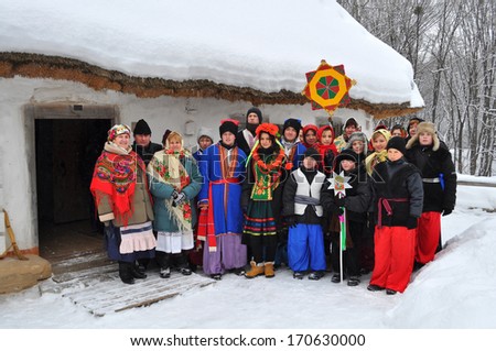 KIEV - JANUARY 13: Folk Ukrainian Group celebrating Christmas Day in the orthodox churches.  Museum of Ukrainian Folk Architecture and Rural Life PYROGOVO, January 13, 2013 in Kiev, Ukraine