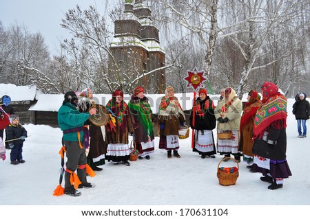 KIEV - JANUARY 13: Folk Ukrainian Group celebrating Christmas Day in the orthodox churches.  Museum of Ukrainian Folk Architecture and Rural Life PYROGOVO, January 13, 2013 in Kiev, Ukraine