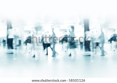 Hurrying crowd of people in the subway corridor. Abstract picture.