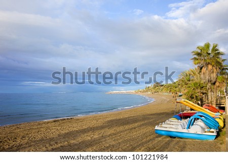 Sandy beach on the Mediterranean Sea in Marbella, Costa del Sol, Andalusia region, Spain