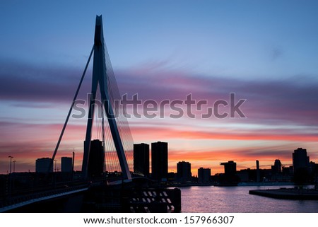 City of Rotterdam skyline silhouette at twilight in Netherlands, South Holland province.